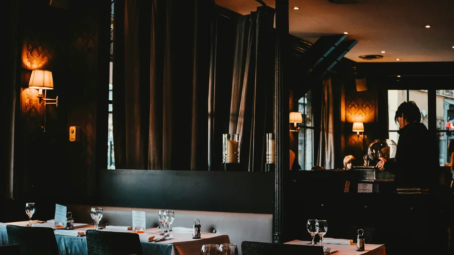 A restaurant dining room set and ready before service