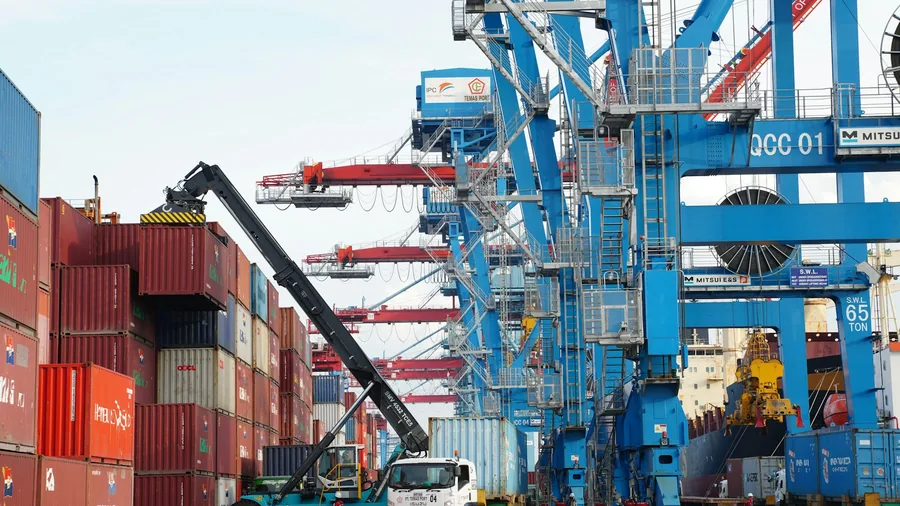 Container ship being worked at a port terminal